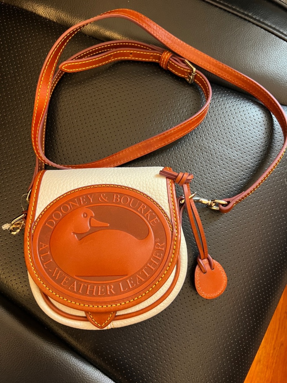 SOLD -  NWT Dooney & Bourke White and Brown Leather Crossbody Saddle Bag